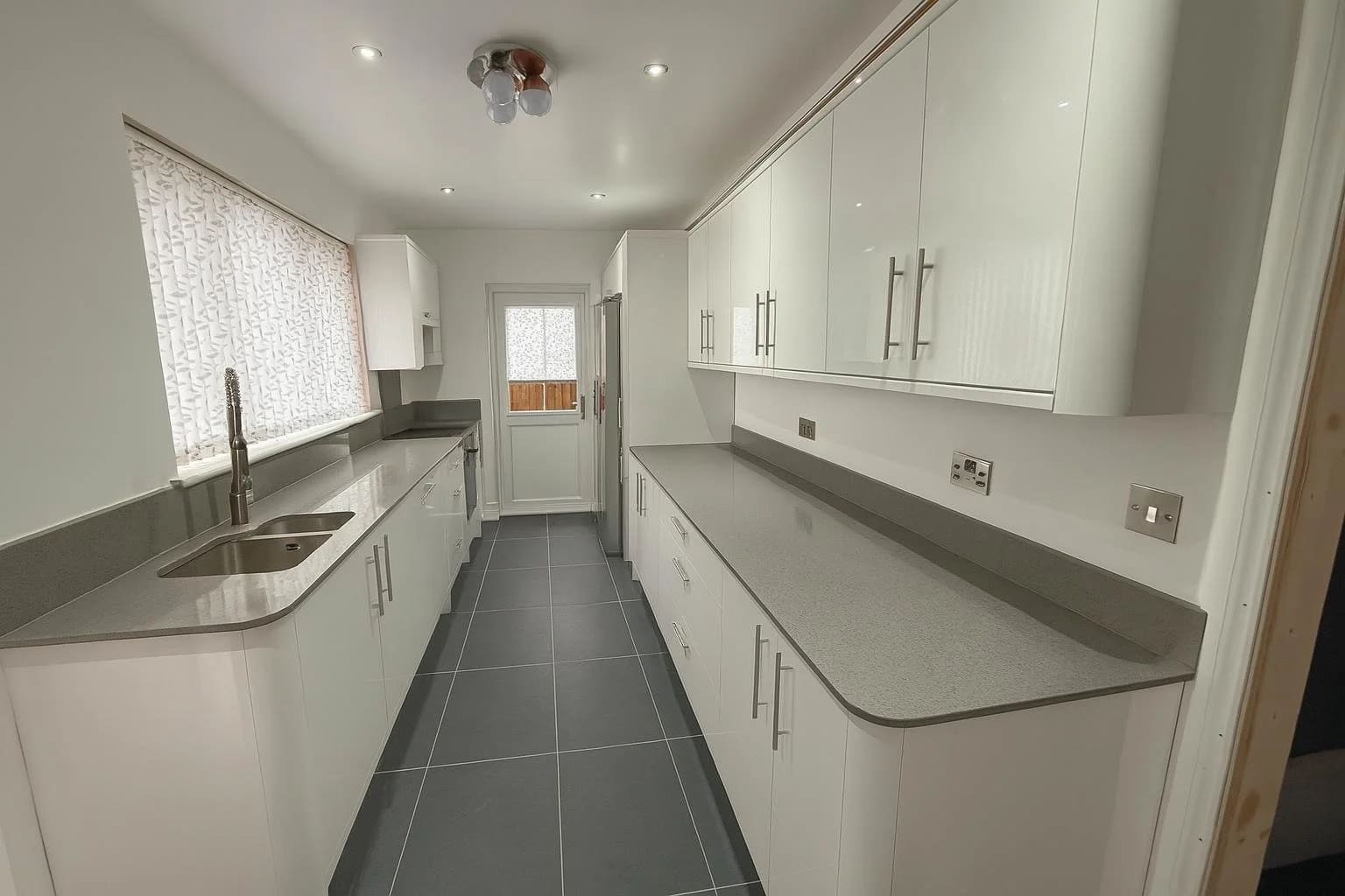 White gloss kitchen fitted in Tilbury